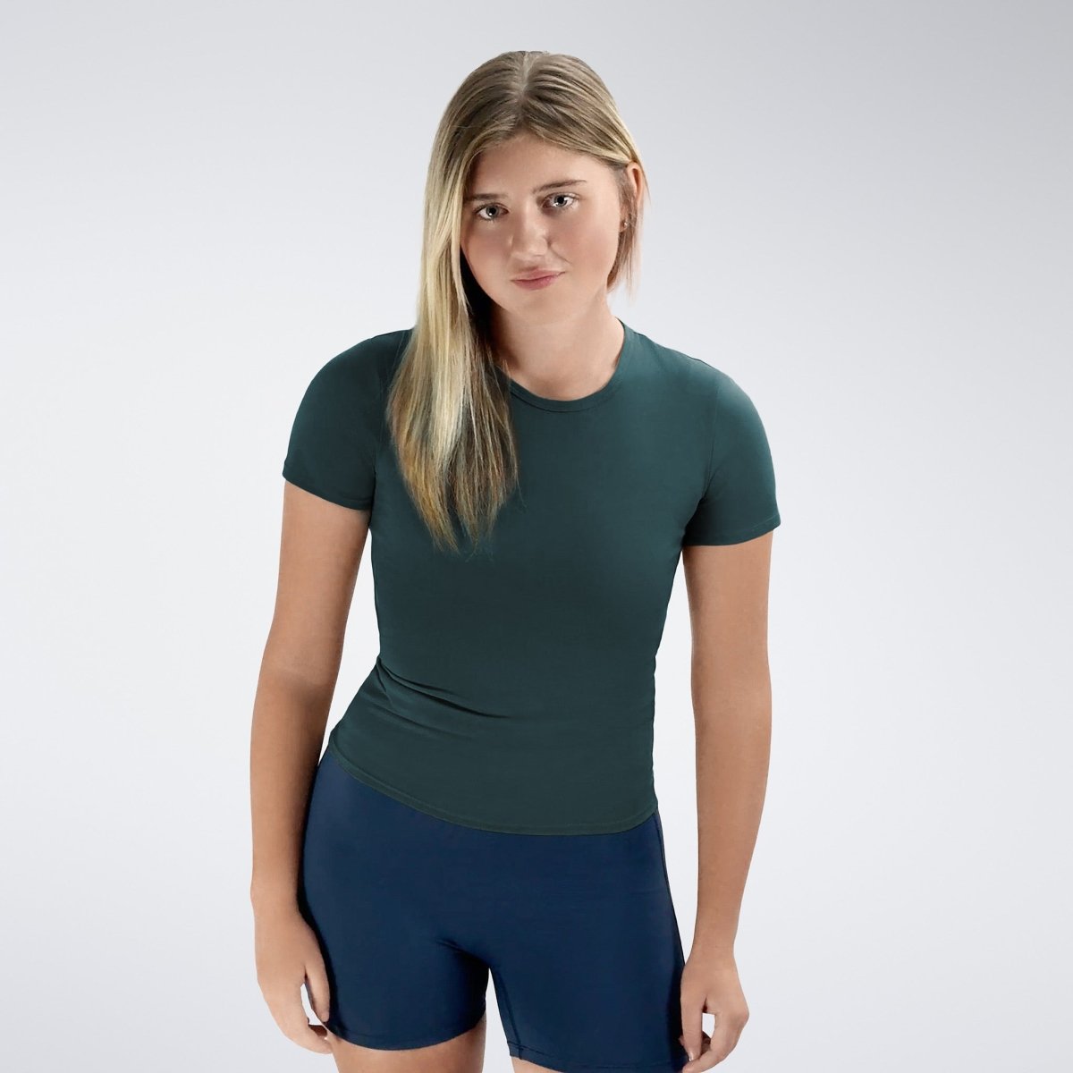 Compression Top in dark green on model - Terra Collection activewear