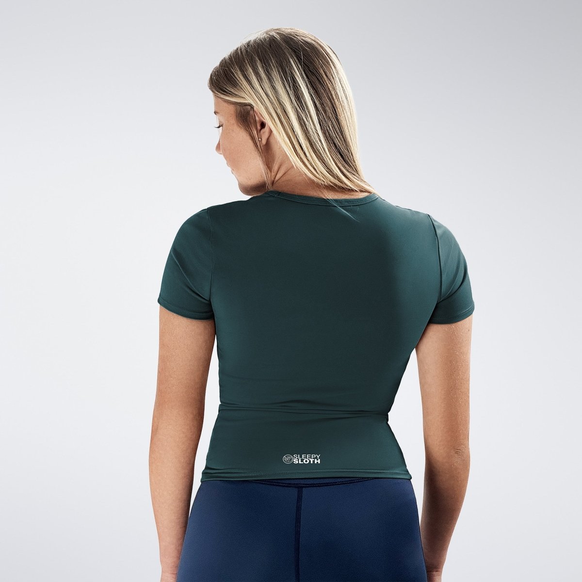 Compression Top in dark green on model - Terra Collection activewear