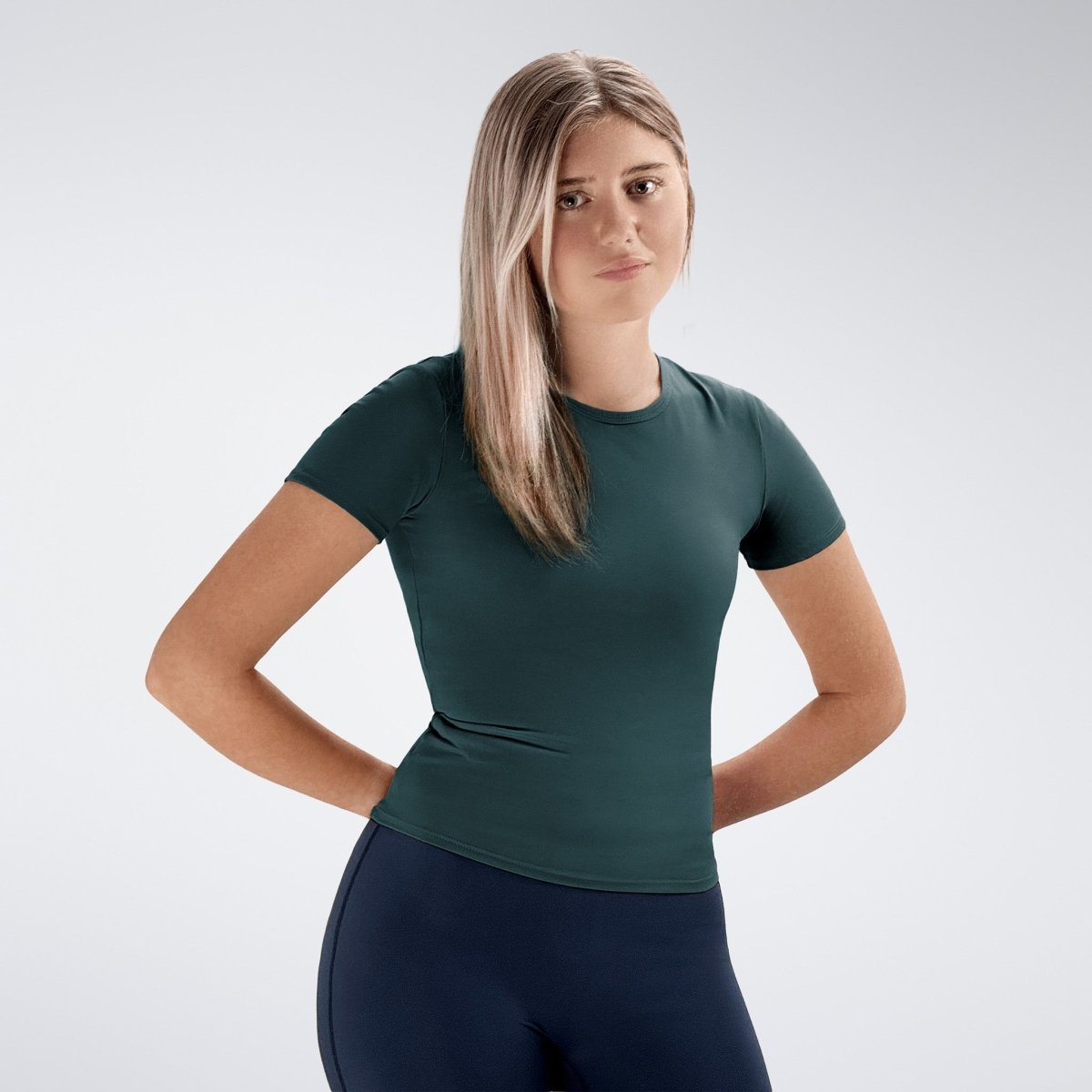 Compression Top in dark green on model - Terra Collection activewear