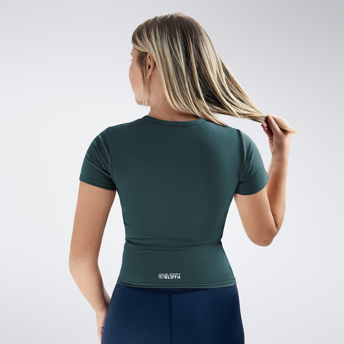 Compression Top in dark green on model - Terra Collection activewear