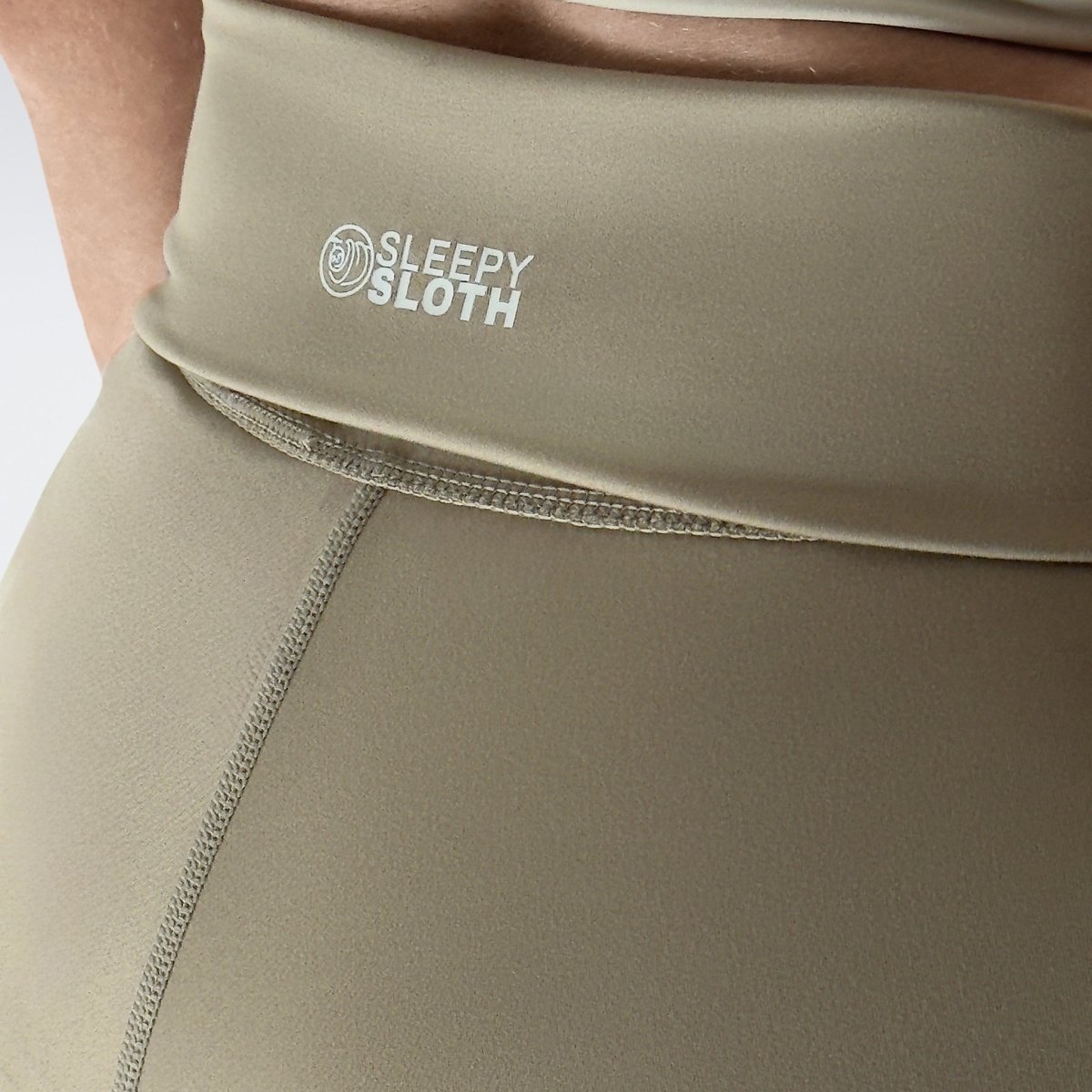 Rolled Shorts in khaki on model - Drift Collection activewear