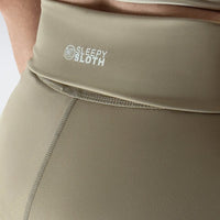 Rolled Shorts in khaki on model - Drift Collection activewear