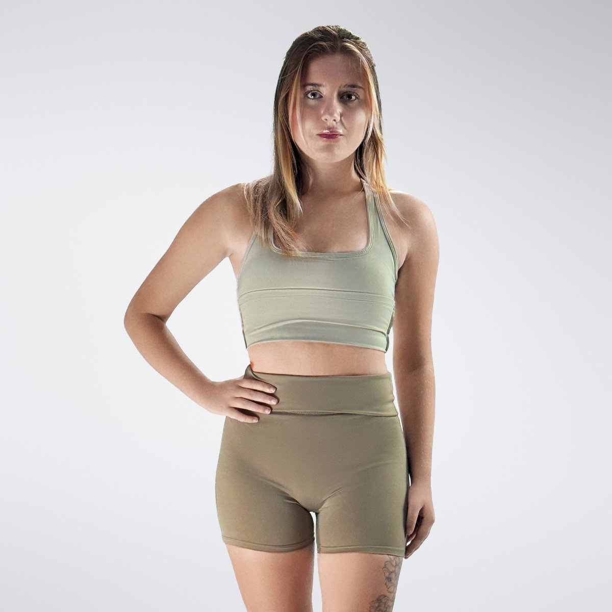 Rolled Shorts in khaki on model - Drift Collection activewear