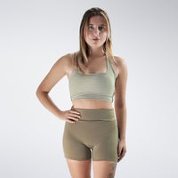 Rolled Shorts in khaki on model - Drift Collection activewear