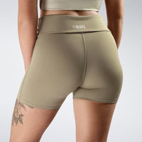 Rolled Shorts in khaki on model - Drift Collection activewear