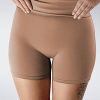 Rolled Shorts in coffee brown on model - Drift Collection activewear