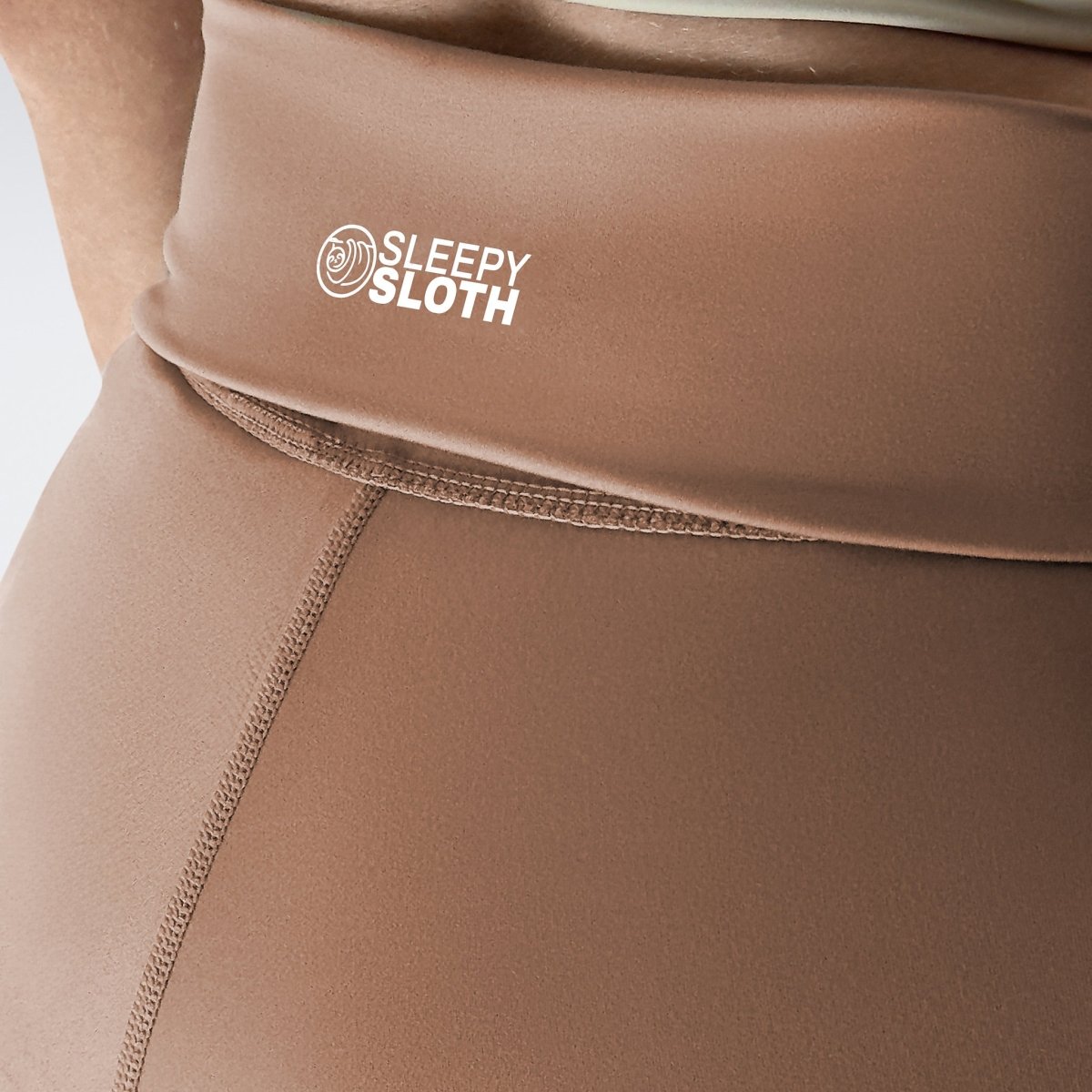 Rolled Shorts in coffee brown on model - Drift Collection activewear