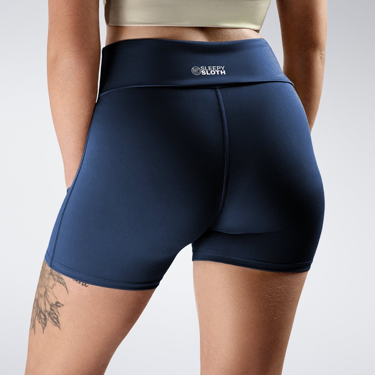 Rolled Shorts in navy on model - Drift Collection activewear