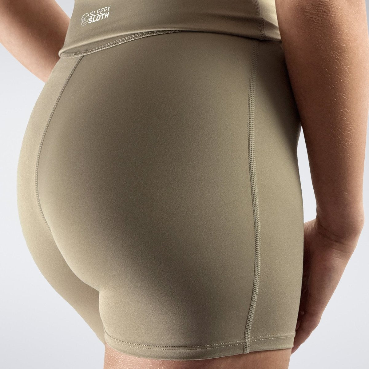 Rolled Shorts in khaki on model - Drift Collection activewear