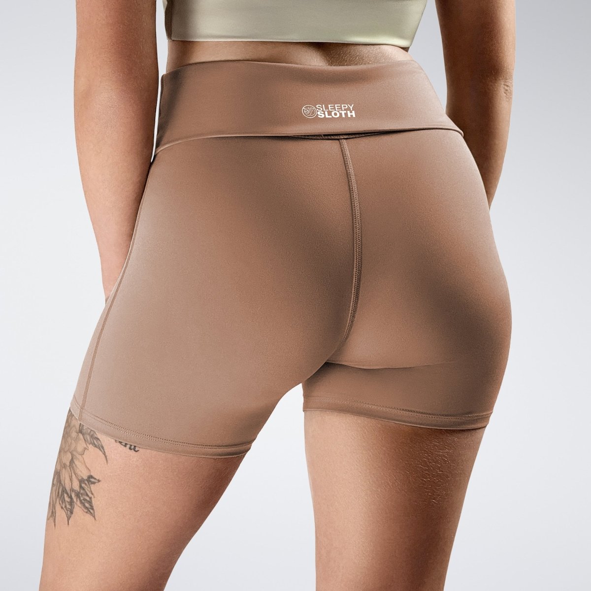 Rolled Shorts in coffee brown on model - Drift Collection activewear
