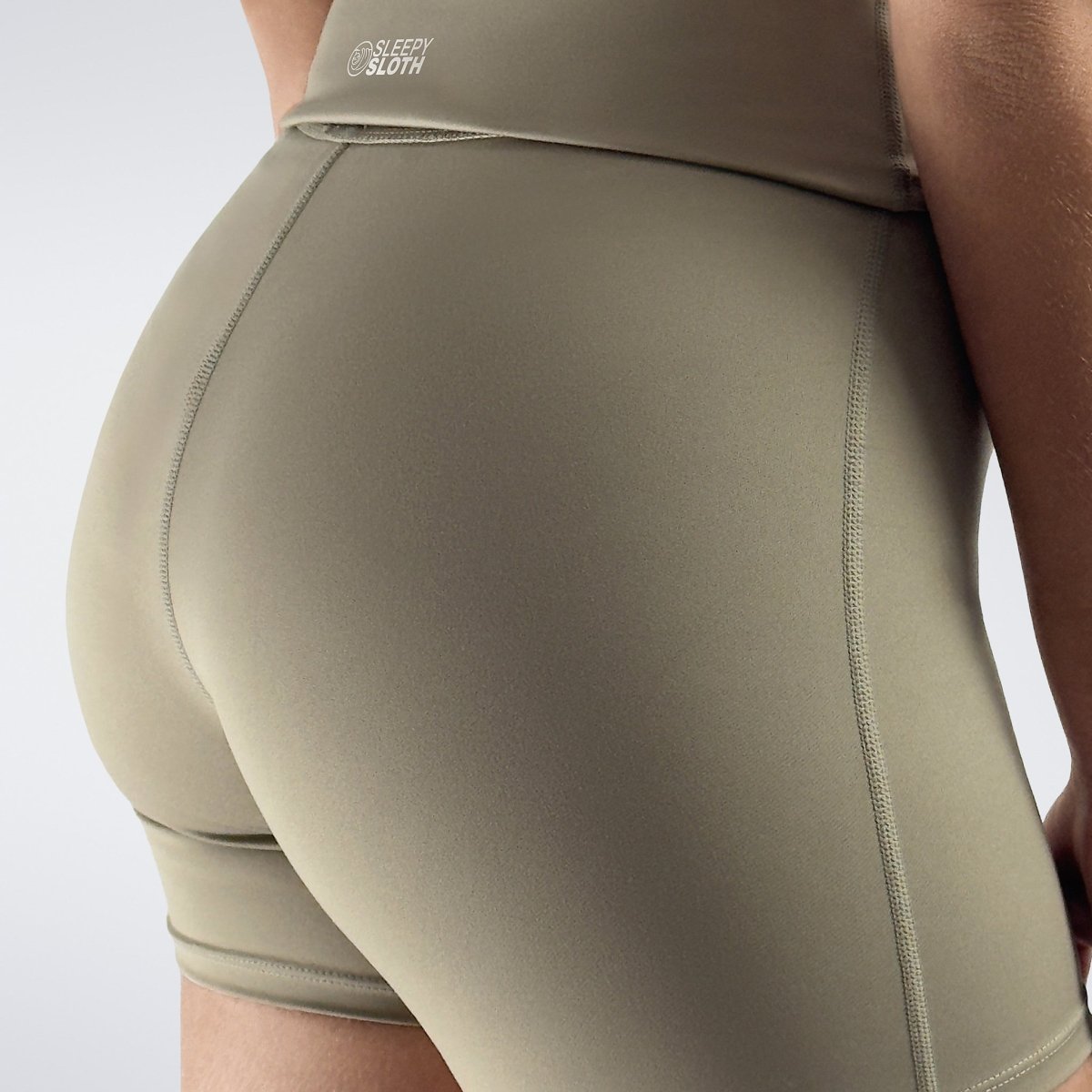 Rolled Shorts in khaki on model - Drift Collection activewear