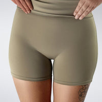 Rolled Shorts in khaki on model - Drift Collection activewear