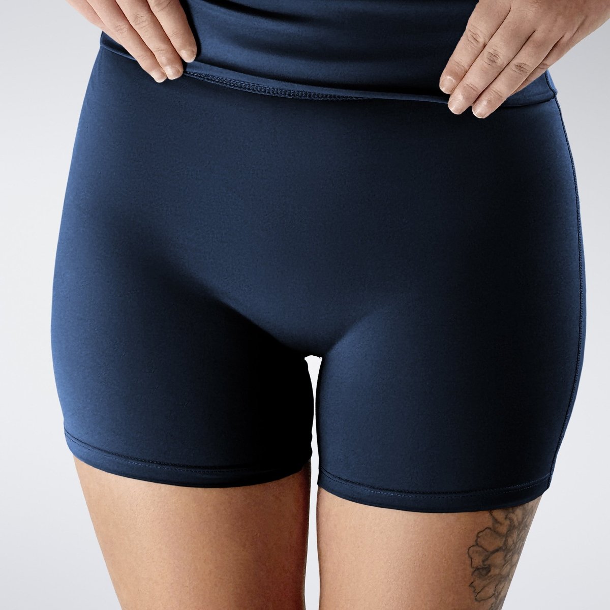 Rolled Shorts in navy on model - Drift Collection activewear