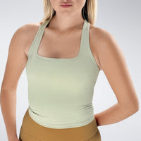 Racerback Tank Vest in ivory cream on model - Echo Collection activewear