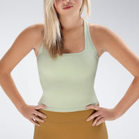 Racerback Tank Vest in ivory cream on model - Echo Collection activewear