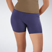 Shorts in purple on model - Flow State Collection activewear