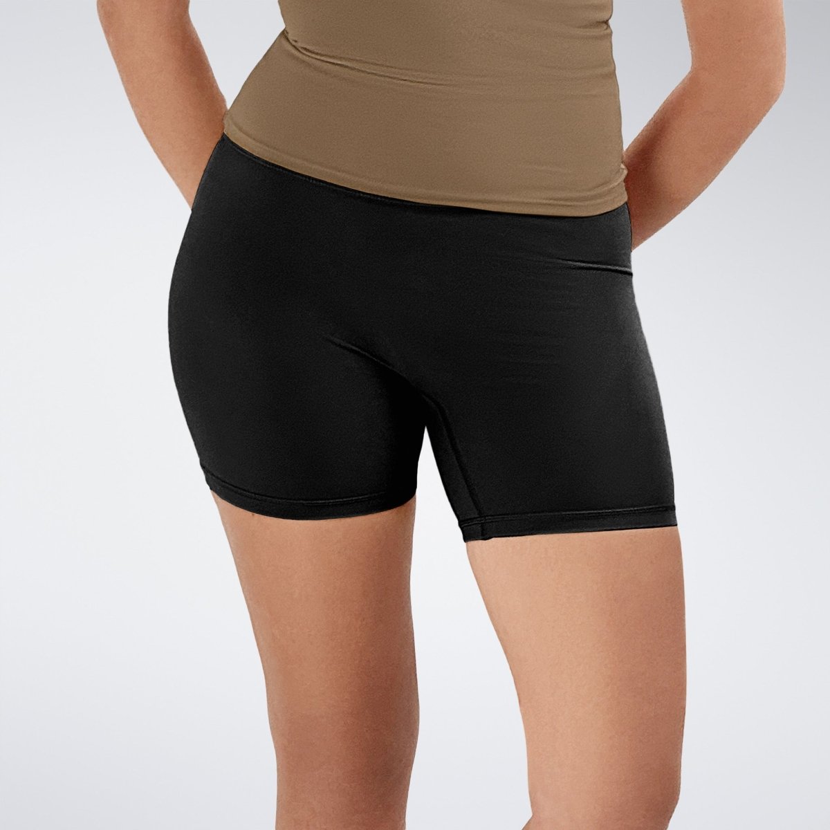 Shorts in black on model - Flow State Collection activewear