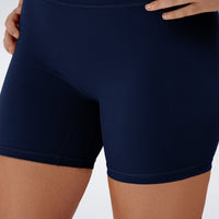 Shorts in midnight blue on model - Flow State Collection activewear