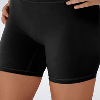 Shorts in black on model - Flow State Collection activewear