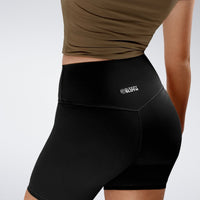 Shorts in black on model - Flow State Collection activewear