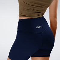 Shorts in midnight blue on model - Flow State Collection activewear
