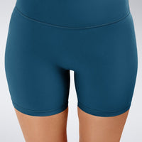 Flow State™ Sustainable Yoga / Pilates Shorts in Peacock Green — product view