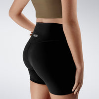 Shorts in black on model - Flow State Collection activewear