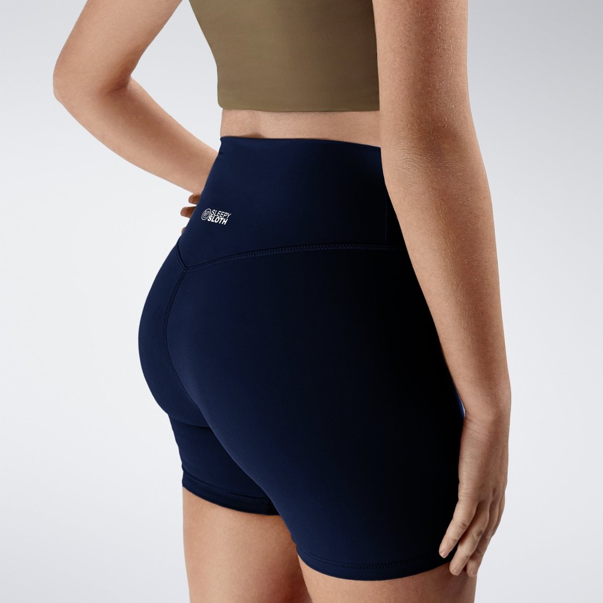 Shorts in midnight blue on model - Flow State Collection activewear