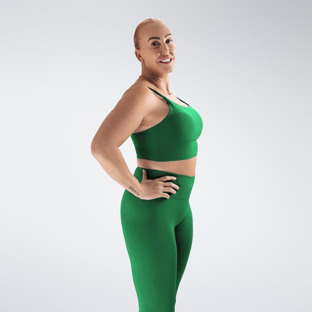 Sports Bra in forest green on model - Flow State activewear