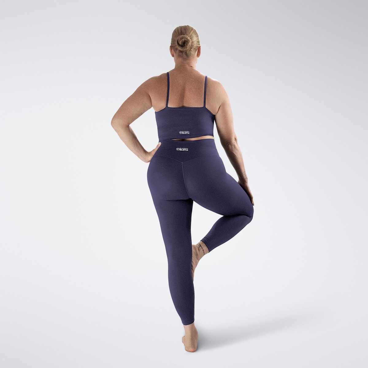 Sports Bra in purple on model - Flow State activewear