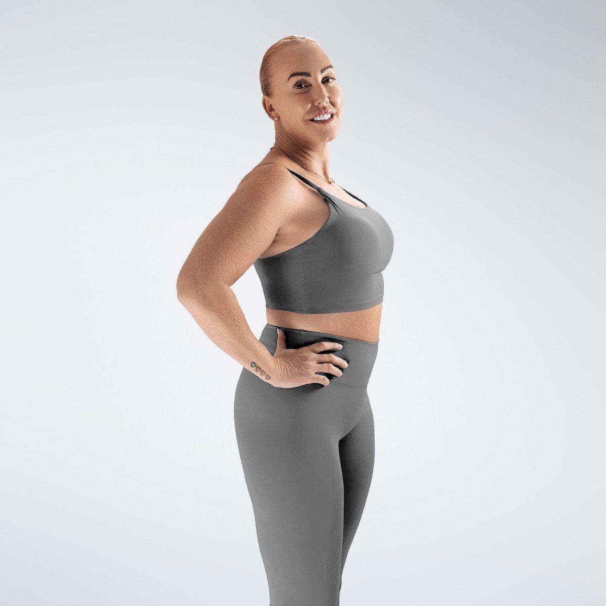 Sports Bra in battleship gray on model - Flow State activewear