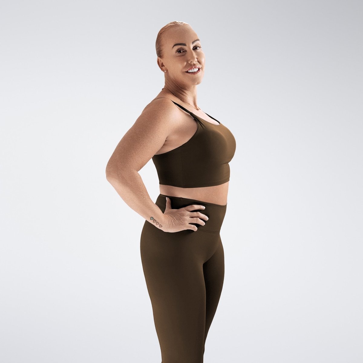 Sports Bra in chocolate brown on model - Flow State activewear