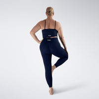 Leggings in midnight blue on model - Flow State activewear