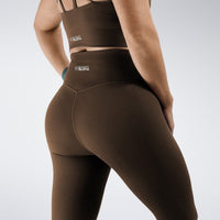 Leggings in chocolate brown on model - Flow State activewear