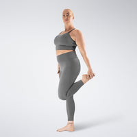 Leggings in battleship gray on model - Flow State activewear