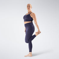 Leggings in purple on model - Flow State activewear