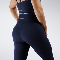 Leggings in midnight blue on model - Flow State activewear