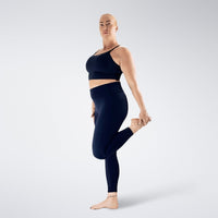 Leggings in midnight blue on model - Flow State activewear
