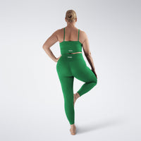 Leggings in forest green on model - Flow State activewear