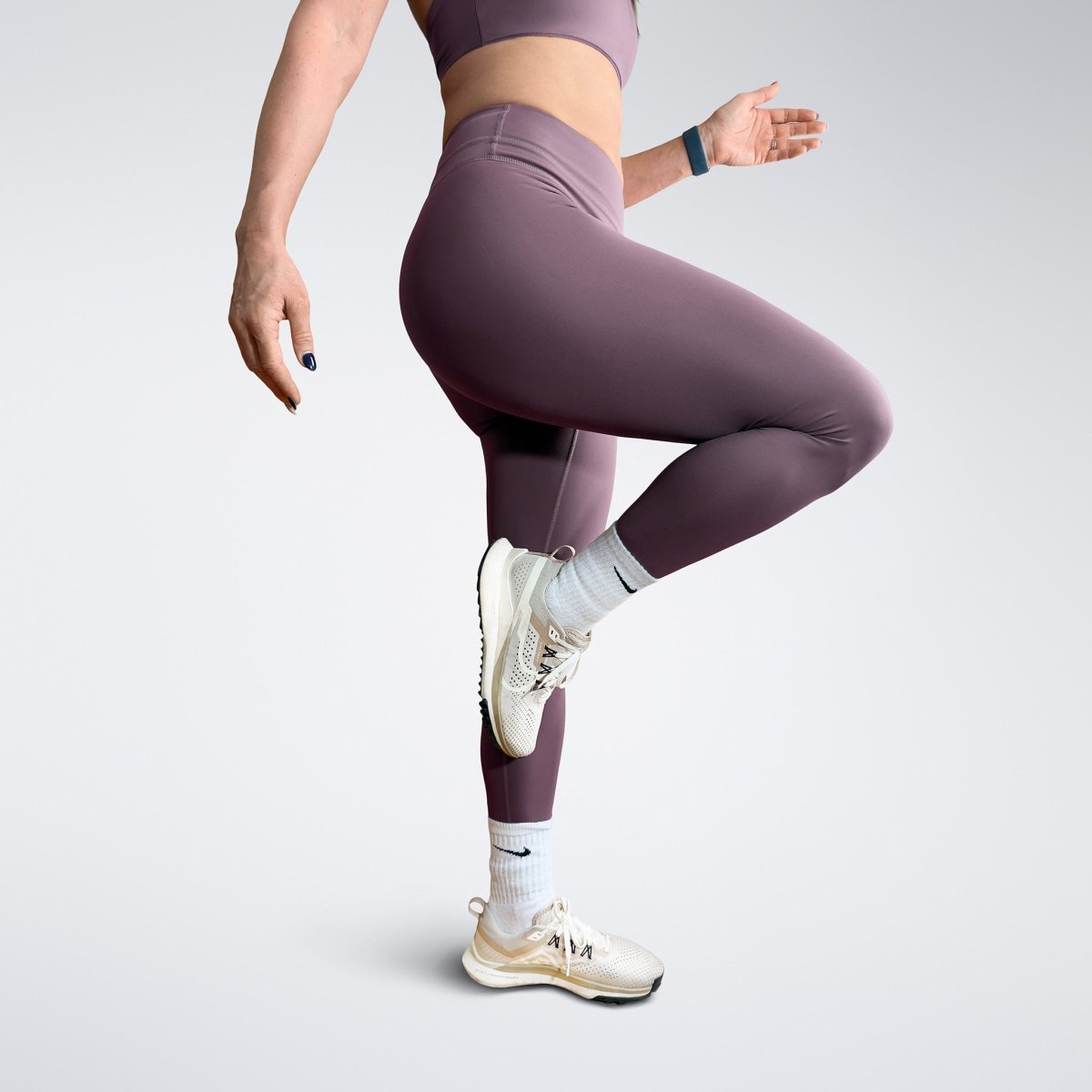 Leggings in plum on model - Halo Collection activewear