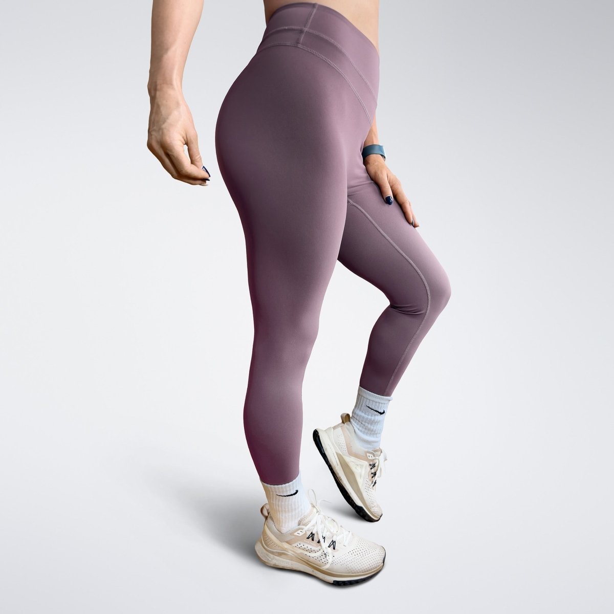 Leggings in plum on model - Halo Collection activewear