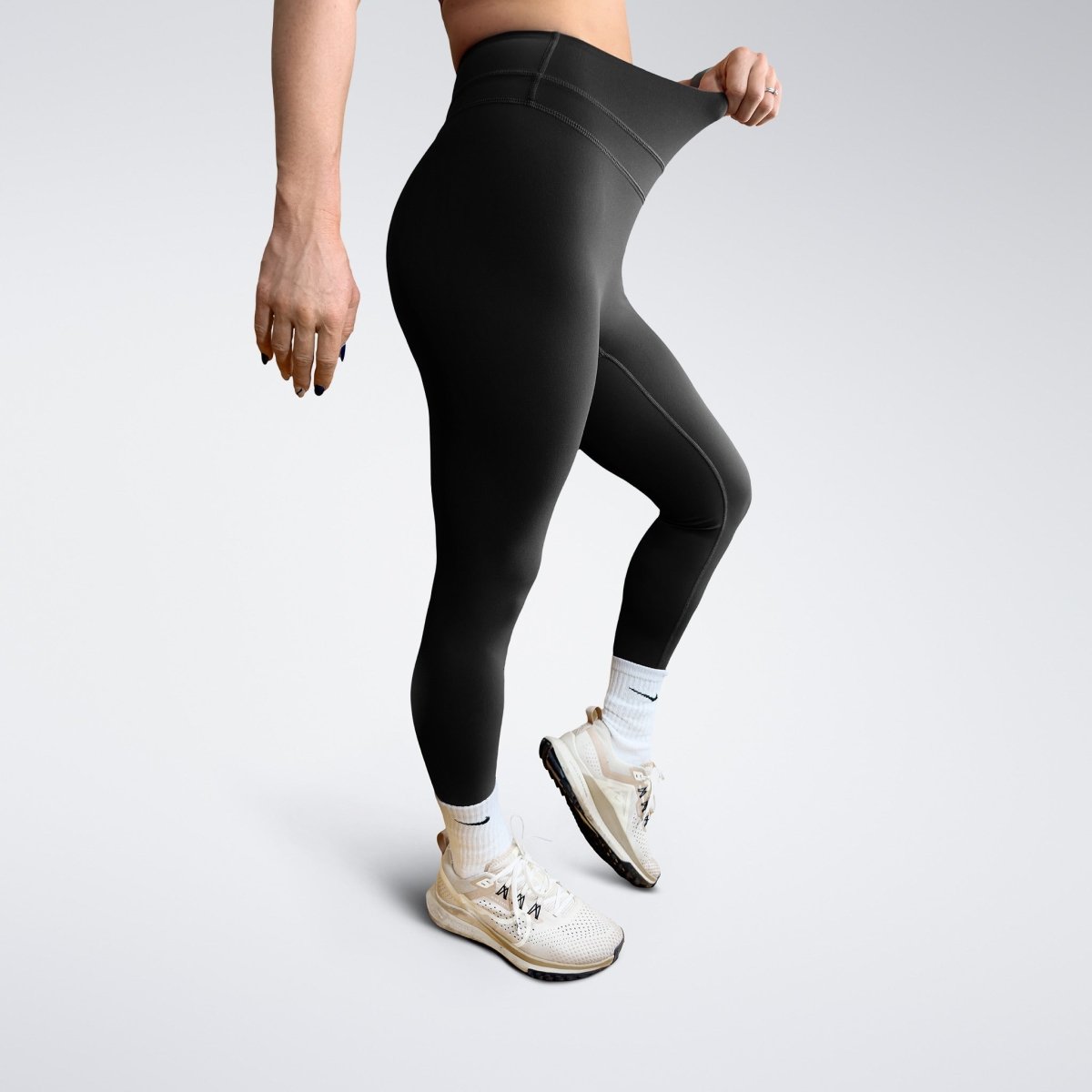 Leggings in black on model - Halo Collection activewear