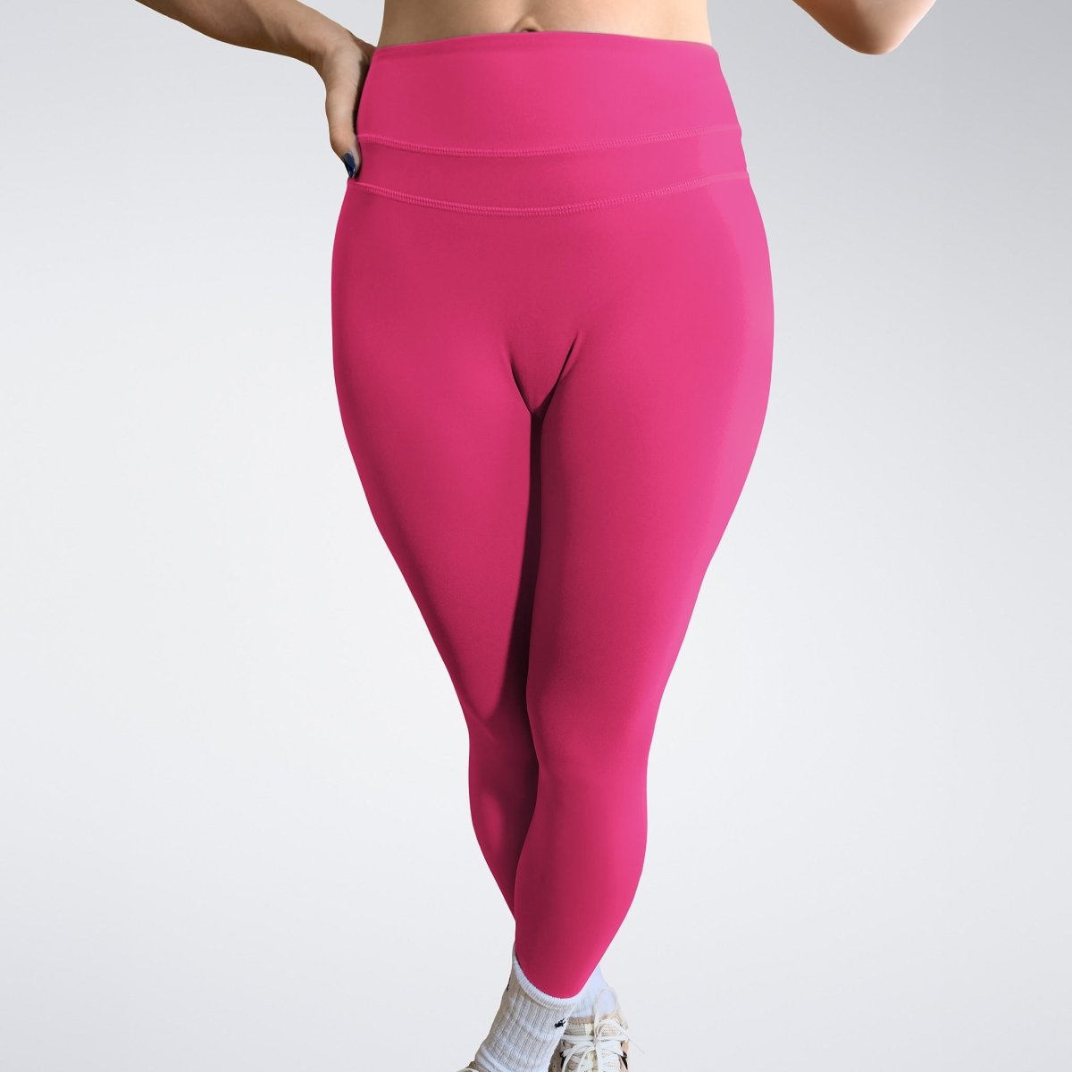 Leggings in hot pink on model - Halo Collection activewear