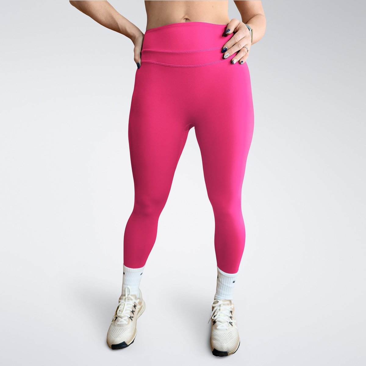 Leggings in hot pink on model - Halo Collection activewear