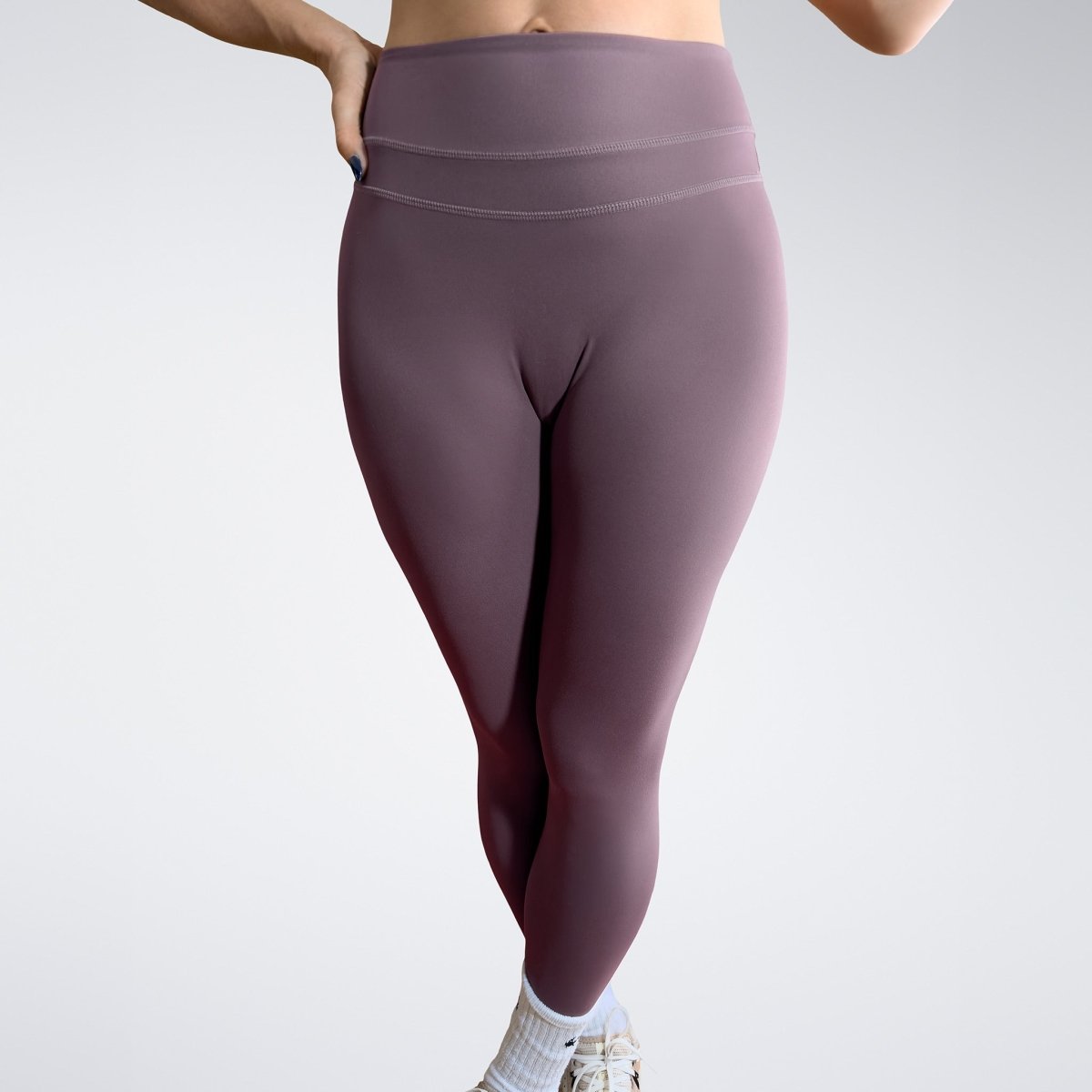 Leggings in plum on model - Halo Collection activewear