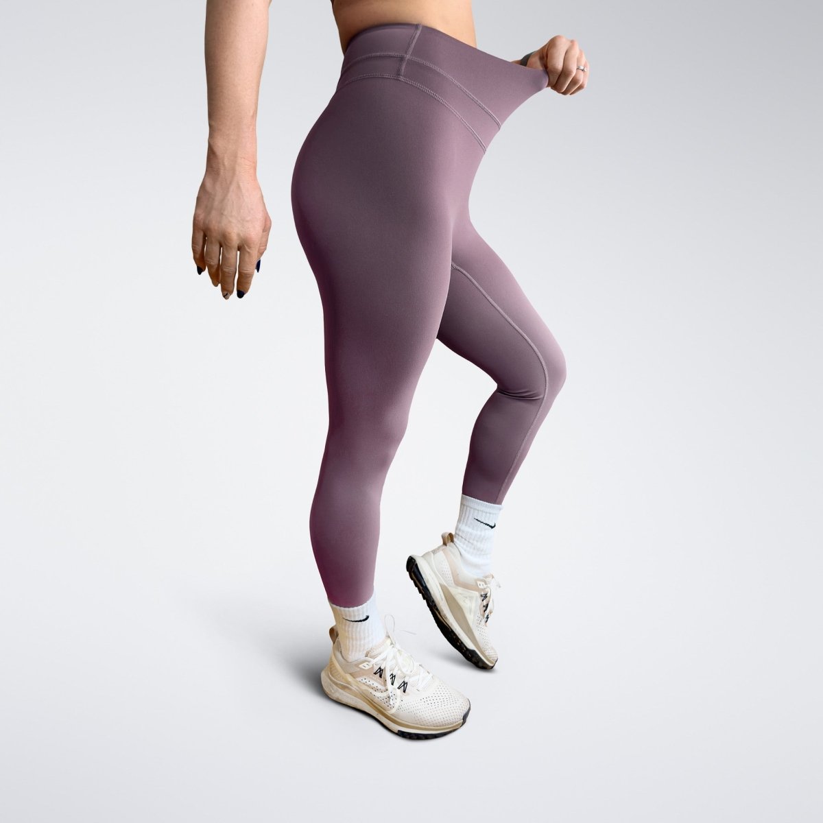 Leggings in plum on model - Halo Collection activewear