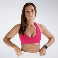 Halter Neck Sports Bra in hot pink on model - Halo Collection activewear