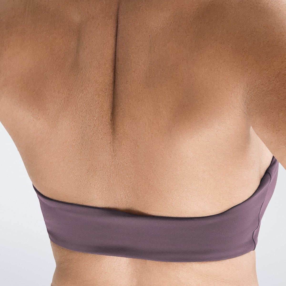 Halter Neck Sports Bra in plum on model - Halo Collection activewear