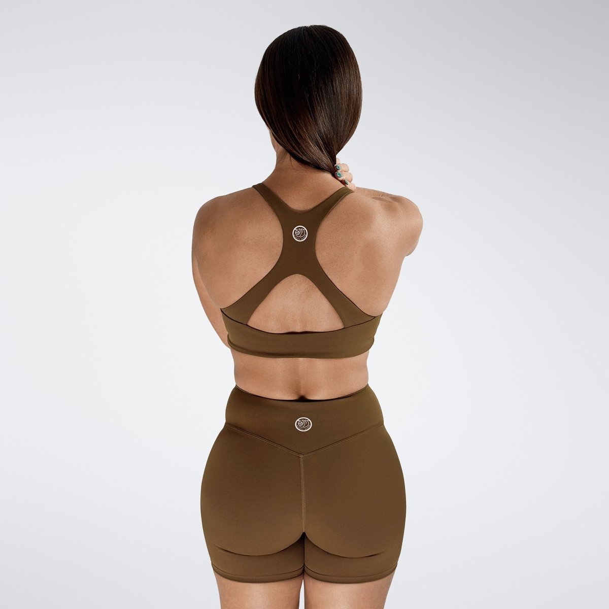 Reformer Cross Back Sports Bra in Chocolate Brown — product view