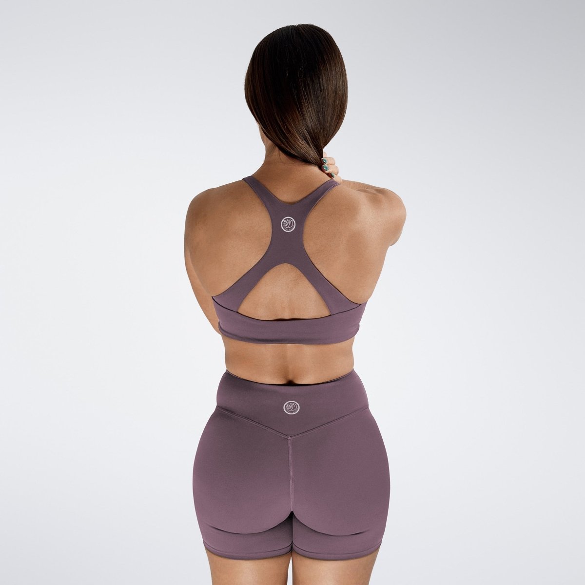 Reformer Cross Back Sports Bra in Plum — product view